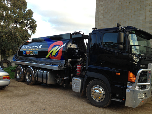 our large black nitschke liquid waste truck