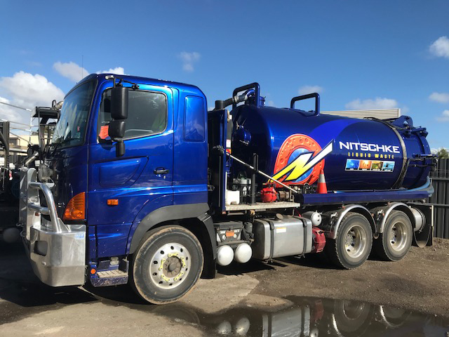 nitschke liquid waste pumping truck getting washed